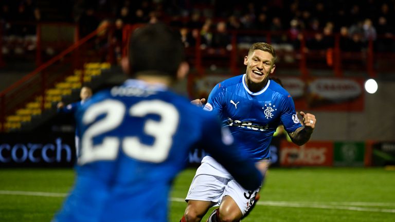 Matryn Waghorn prepares to  celebrate his 10th goal of the season with Jason Holt