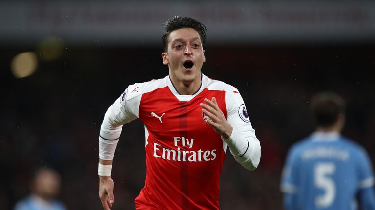 Mesut Ozil scores Arsenal's second against Stoke