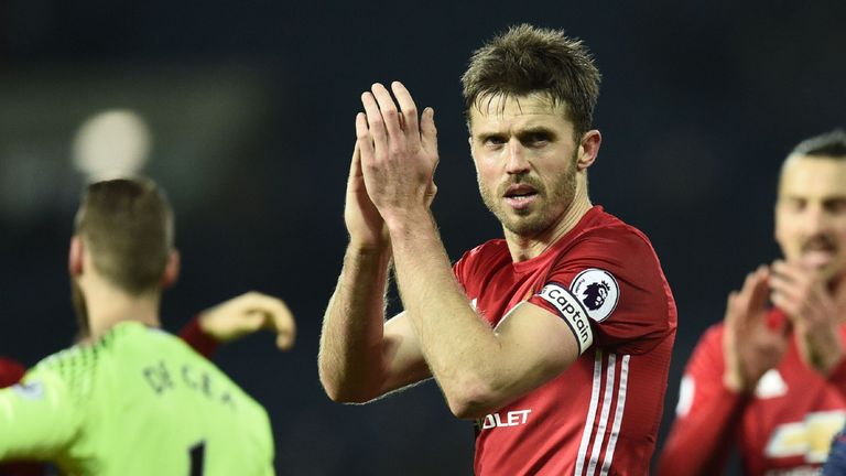 Michael Carrick applauds Manchester United fans at the Hawthorns