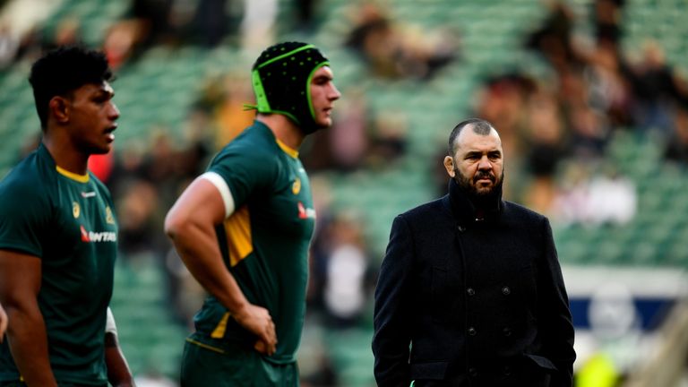 LONDON, ENGLAND - DECEMBER 03: Michael Cheika, head coach of Australia (R) looks on during the warm up prior to kick off during the Old Mutual Wealth Serie