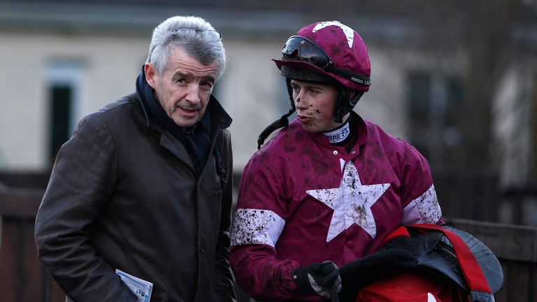 Gigginstown owner Michael O'Leary (L) with jockey Bryan Cooper at Fairyhouse racecourse 