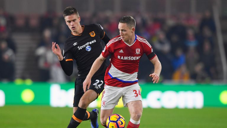 MIDDLESBROUGH, ENGLAND - DECEMBER 05:  Adam Forshaw of Middlesbrough is chased by Markus Henriksen of Hull City during the Premier League match between Mid