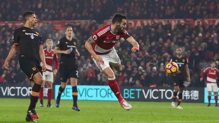 MIDDLESBROUGH, ENGLAND - DECEMBER 05:  Alvaro Negredo of Middlesbrough beats Curtis Davies of Hull City to the ball during the Premier League match between