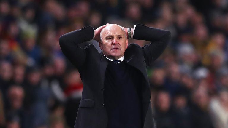 Mike Phelan reacts on the touchline during the match between Hull City and Manchester City