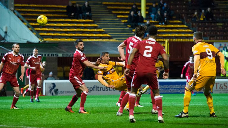 Motherwell's Scott McDonald scores to make it 1-1 with an overhead kick