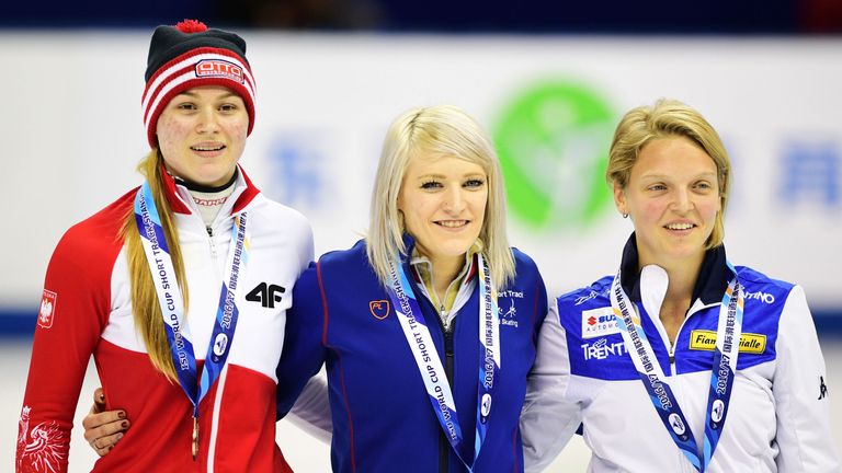 Elise Christie (centre) has claimed her second gold of the weekend