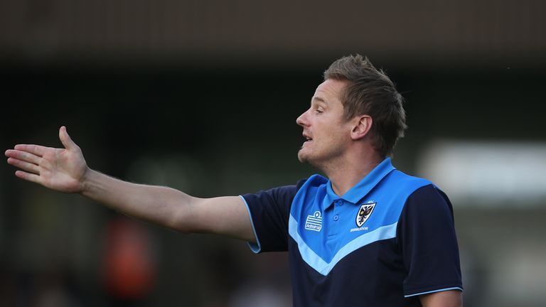 AFC Wimbledon manager Neal Ardley gestures on the touchline during the pre-season friendly match at the Cherry Red Records Stadium, London.