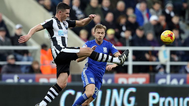 Birmingham City's Greg Stewart (right) battles for the ball with Newcastle United's Ciaran Clark 