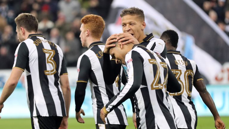 Newcastle United's Dwight Gayle celebrates scoring his sides second goal with teammates during the Sky Bet Championship match at St James' Park, Newcastle.
