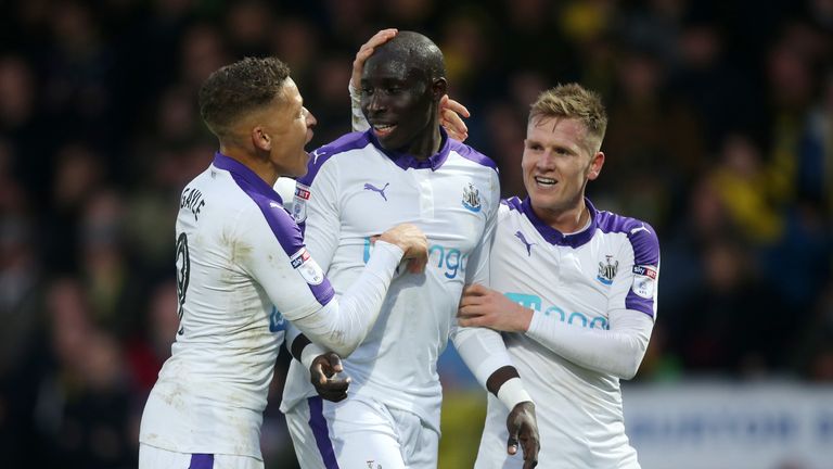 Newcastle United's Mohamed Diame (centre) celebrates after scoring against Burton