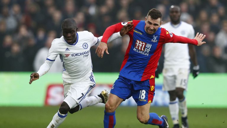 Chelsea's French midfielder N'Golo Kante (L) vies with Crystal Palace's Scottish midfielder James McArthur during the English Premier League football match