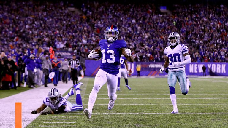 EAST RUTHERFORD, NJ - DECEMBER 11:  Odell Beckham Jr. #13 of the New York Giants scores a 61 yard touchdown against the Dallas Cowboys during the third qua