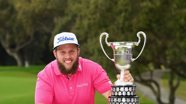 SOTOGRANDE, SPAIN - APRIL 17:  Andrew Johnston of England poses with the trophy after victory during the final round on day four of the Open de Espana at R