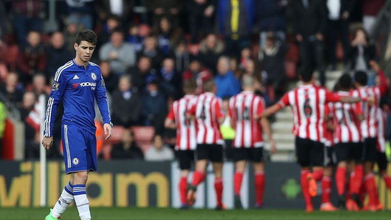 Chelsea's Brazilian midfielder Oscar (L) reacts after Southampton scored the opening goal during the English Premier League football match between Southamp