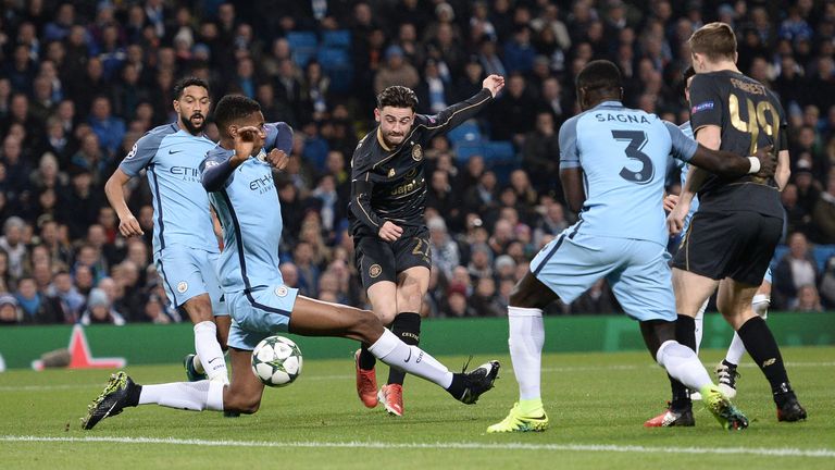 Celtic's English midfielder Patrick Roberts (C) scores his team's first goal during the UEFA Champions League group C football match between Manchester Cit