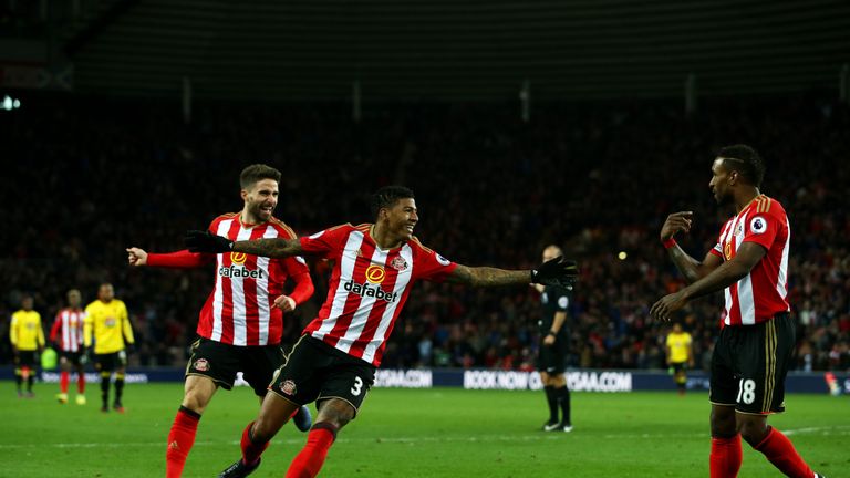 SUNDERLAND, ENGLAND - DECEMBER 17:  Patrick van Aanholt of Sunderland (C) celebrates scoring his sides first goal with Jermain Defoe of Sunderland (R) 