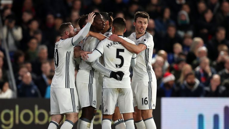 Paul Pogba (C) celebrates his goal with his team-mates