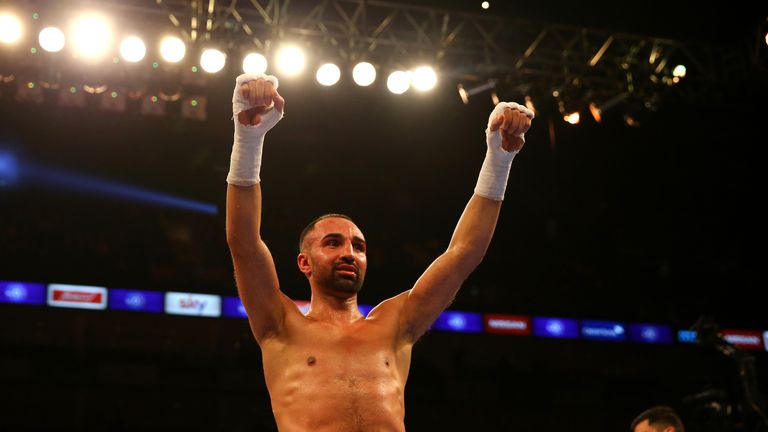 LONDON, ENGLAND - DECEMBER 12:  Paulie Malignaggi (white) celebrates beating Antonio Moscatiello (red) for the Vacant EU Welterweight Championship during t