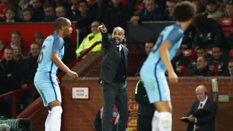 Pep Guardiola, manager of Manchester City gives his team instructions during the EFL Cup fourth round match v Manchester United, October 26