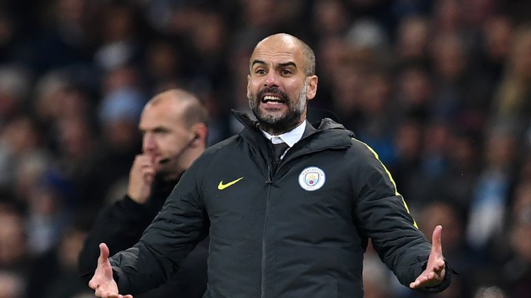 Manchester City's Spanish manager Pep Guardiola gestures on the touchline during the English Premier League football match between Manchester City and Arse
