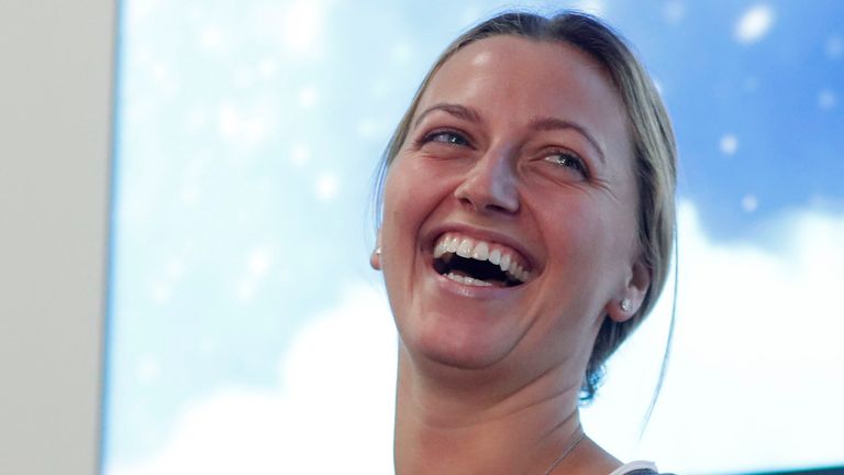 Petra Kvitova smiles and laughs during a press conference which followed the knife attack on her