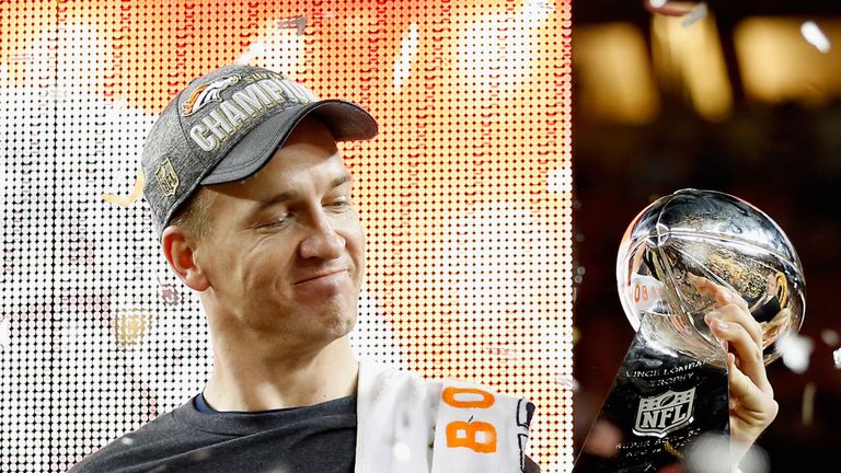 Peyton Manning holds the Vince Lombardi Trophy following Super Bowl 50