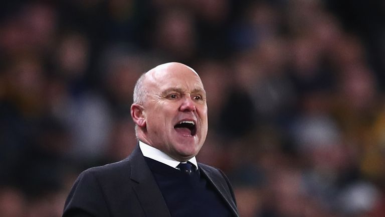 Mike Phelan shouts instructions against Manchester Manchester City