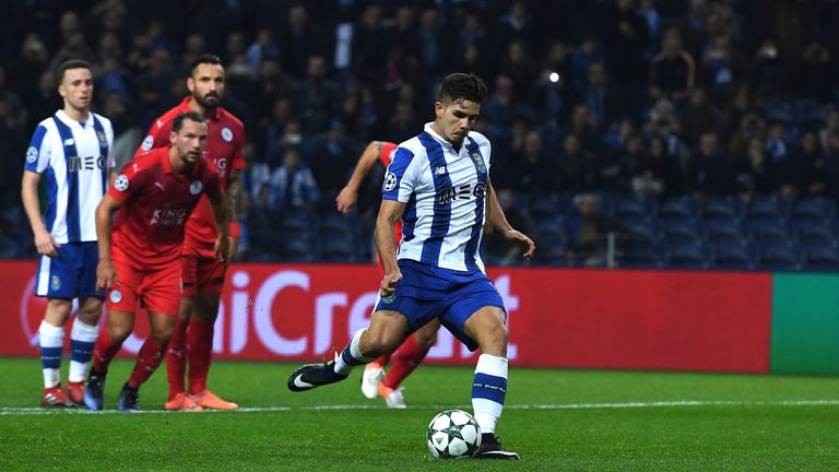 PORTO, PORTUGAL - DECEMBER 07:  Andre Silva of FC Porto (C) scores his sides fourth goal from the penalty spot during the UEFA Champions League Group G mat