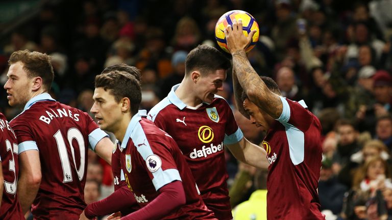 Andre Gray celebrates after scoring his and Burnley's third goal of the game
