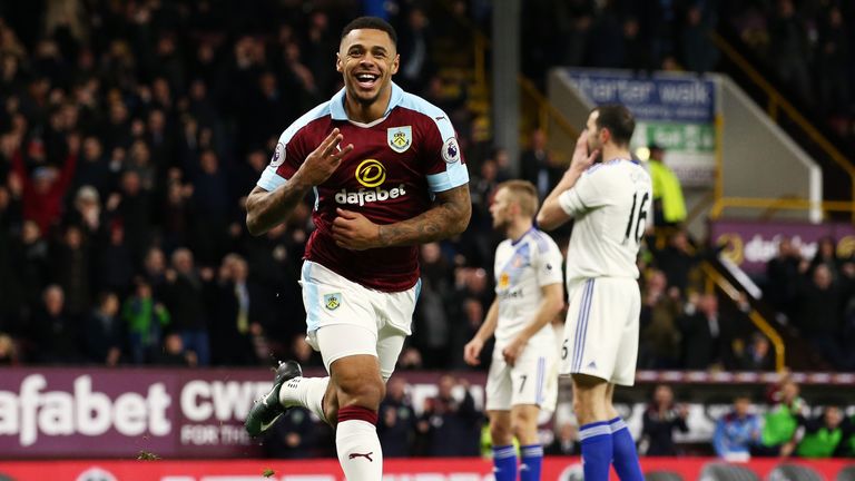 Andre Gray celebrates after netting his and Burnley's third goal of the game