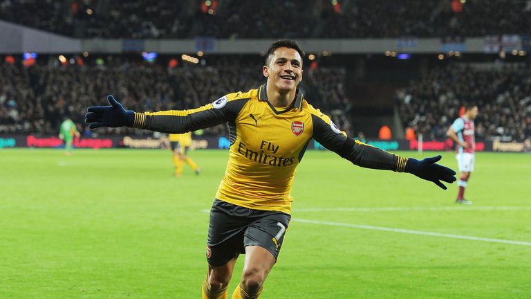 Alexis Sanchez celebrates scoring the 2nd Arsenal goal against West Ham United