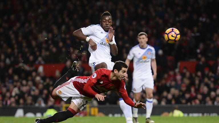 Henrikh Mkhitaryan scores Manchester United's third goal with an acrobatic effort