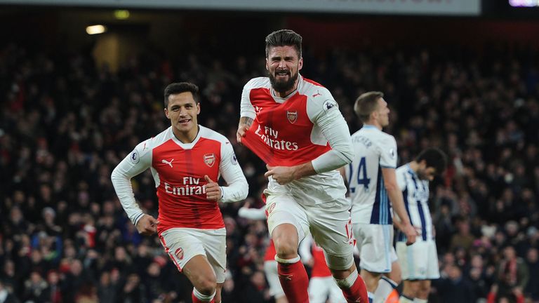 Olivier Giroud celebrates after scoring a late winner against West Brom at the Emirates Stadium