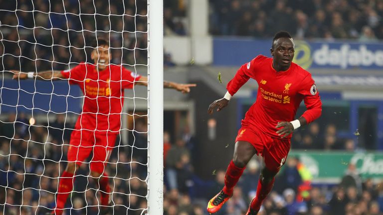 Sadio Mane runs a way from goal after his late strike secures all three points for Liverpool at Goodison Park