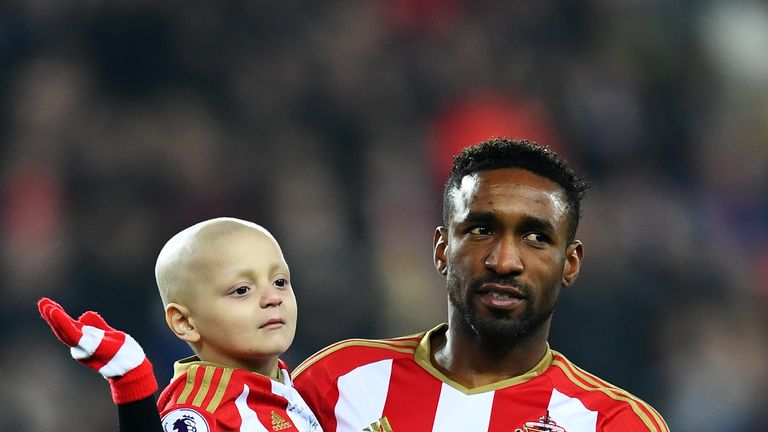Bradley Lowrey and Jermain Defoe on the pitch prior to kick off at the Stadium of Light