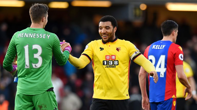 Troy Deeney shakes hands with Wayne Hennessey at full time
