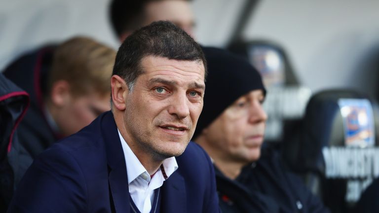 Slaven Bilic looks from the bench on prior to the match between Swansea City and West Ham United