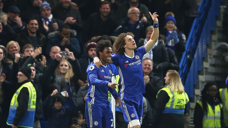 Willian celebrates the first of his two goals with David Luiz
