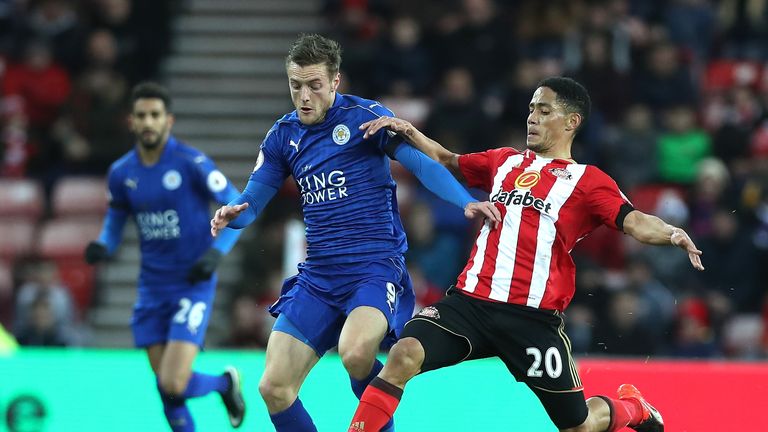 Jamie Vardy of Leicester City and Steven Pienaar of Sunderland compete for the ball