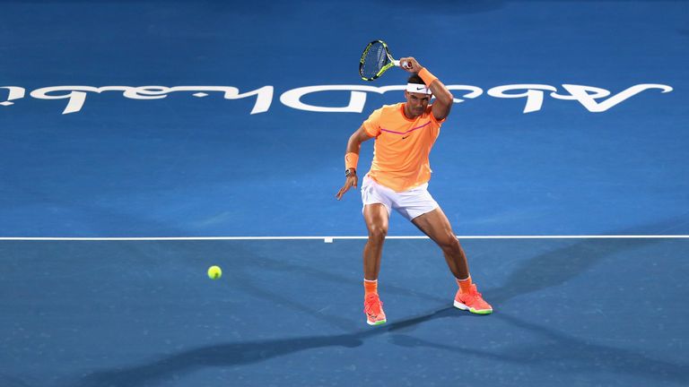 Rafael Nadal of Spain in action against  Milos Raonic during day two of the Mubadala World Tennis Championship