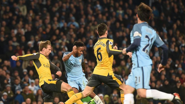 Raheem Sterling's low strike gives Manchester City the lead at the Etihad Stadium