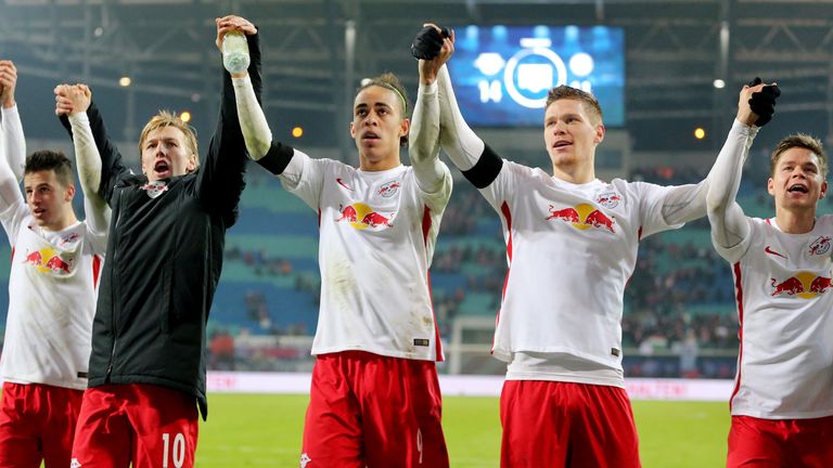 Leipzig's players celebrate after the German first division Bundesliga football match between RB Leipzig and Schalke 04 in Leipzig, eastern Germany on Dece