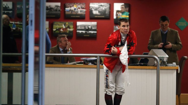Richard Johnson waits to weigh out before his ride on The New One at Cheltenham.
