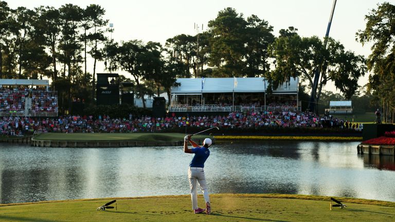 PONTE VEDRA BEACH, FL - MAY 10:  Rickie Fowler plays his shot from the 17th tee during a playoff in the final round of THE PLAYERS Championship at the TPC 