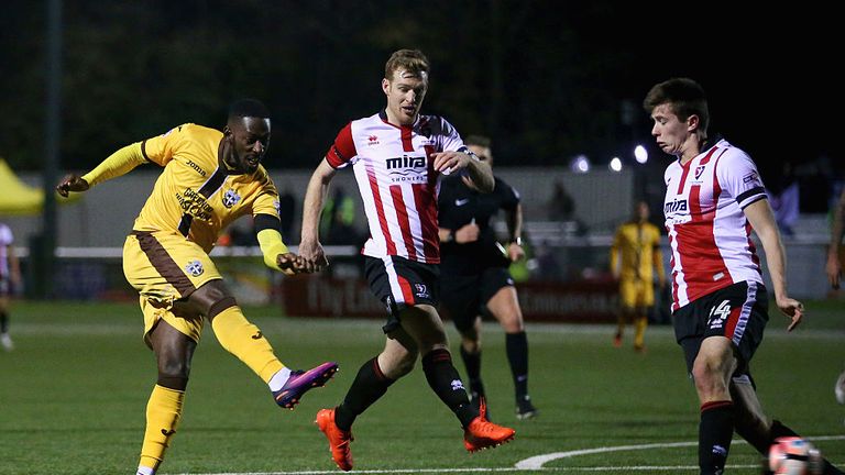 Roarie Deacon of Sutton United scores his teams winning goal