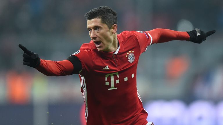 Bayern Munich striker Robert Lewandowski celebrates scoring the opening goal