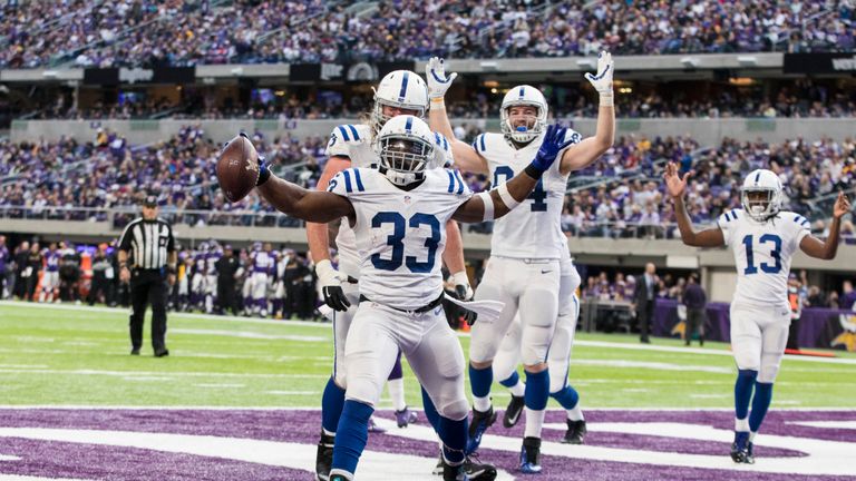 MINNEAPOLIS, MN - DECEMBER 18: Robert Turbin #33 of the Indianapolis Colts celebrates a touchdown in the second quarter of the game against the Minnesota V