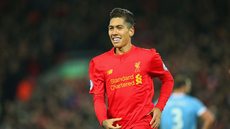 Roberto Firmino celebrates after scoring Liverpool's second goal against Stoke