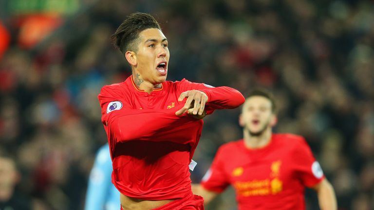 Roberto Firmino celebrates after scoring Liverpool's second goal of the game