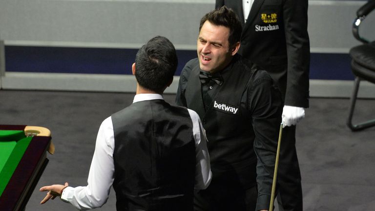 O'Sullivan chats to Fu at the end of their semi